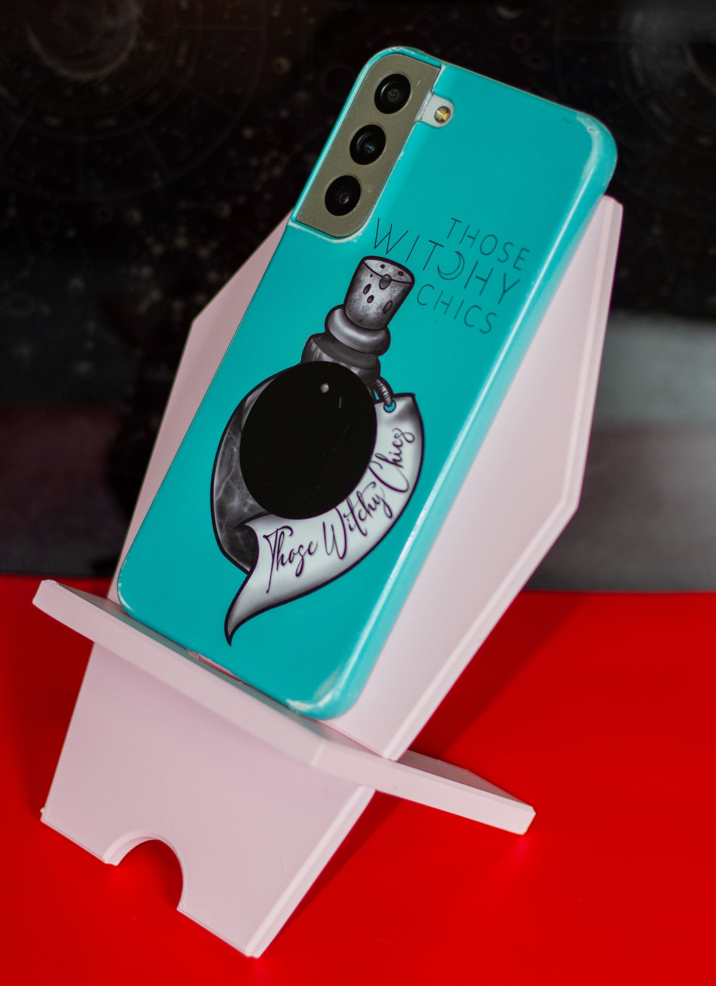Coffin phone holder