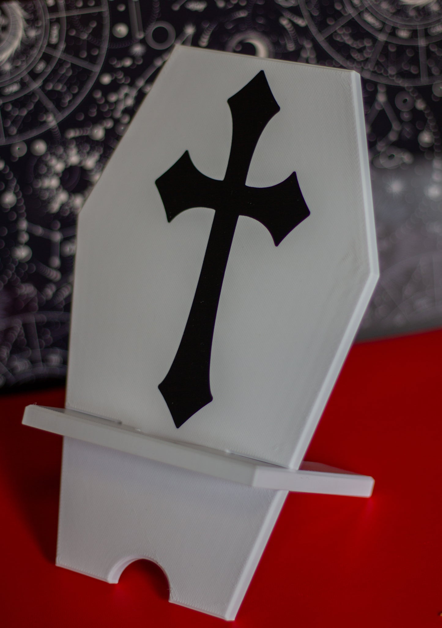 Coffin phone holder