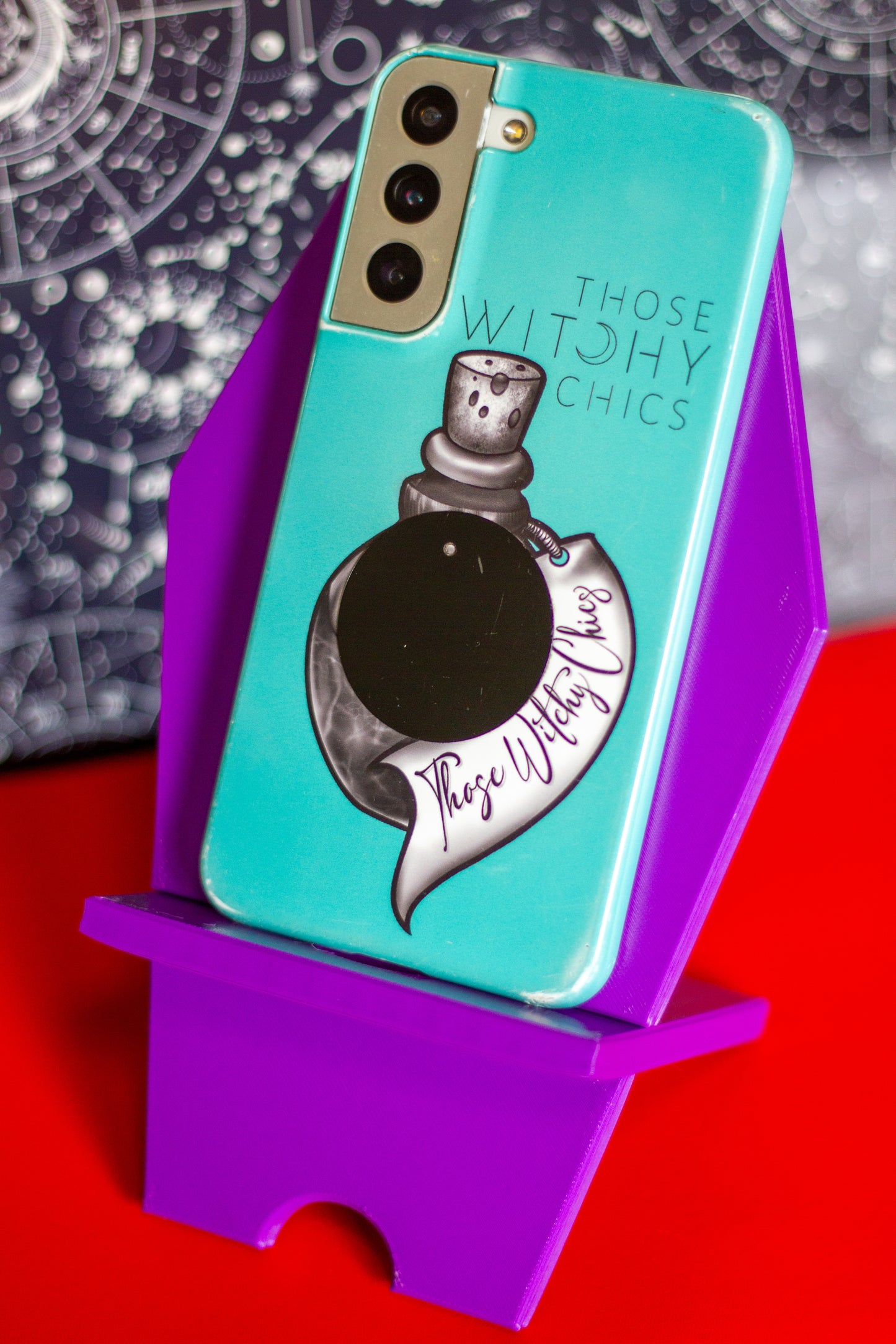 Coffin phone holder